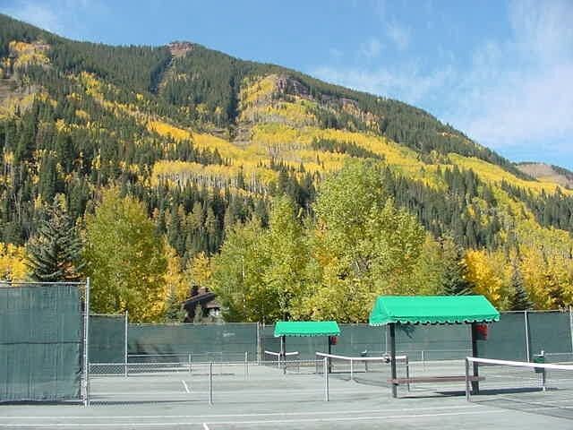 Vail Racquet Club Tennis courts with mountains in the background