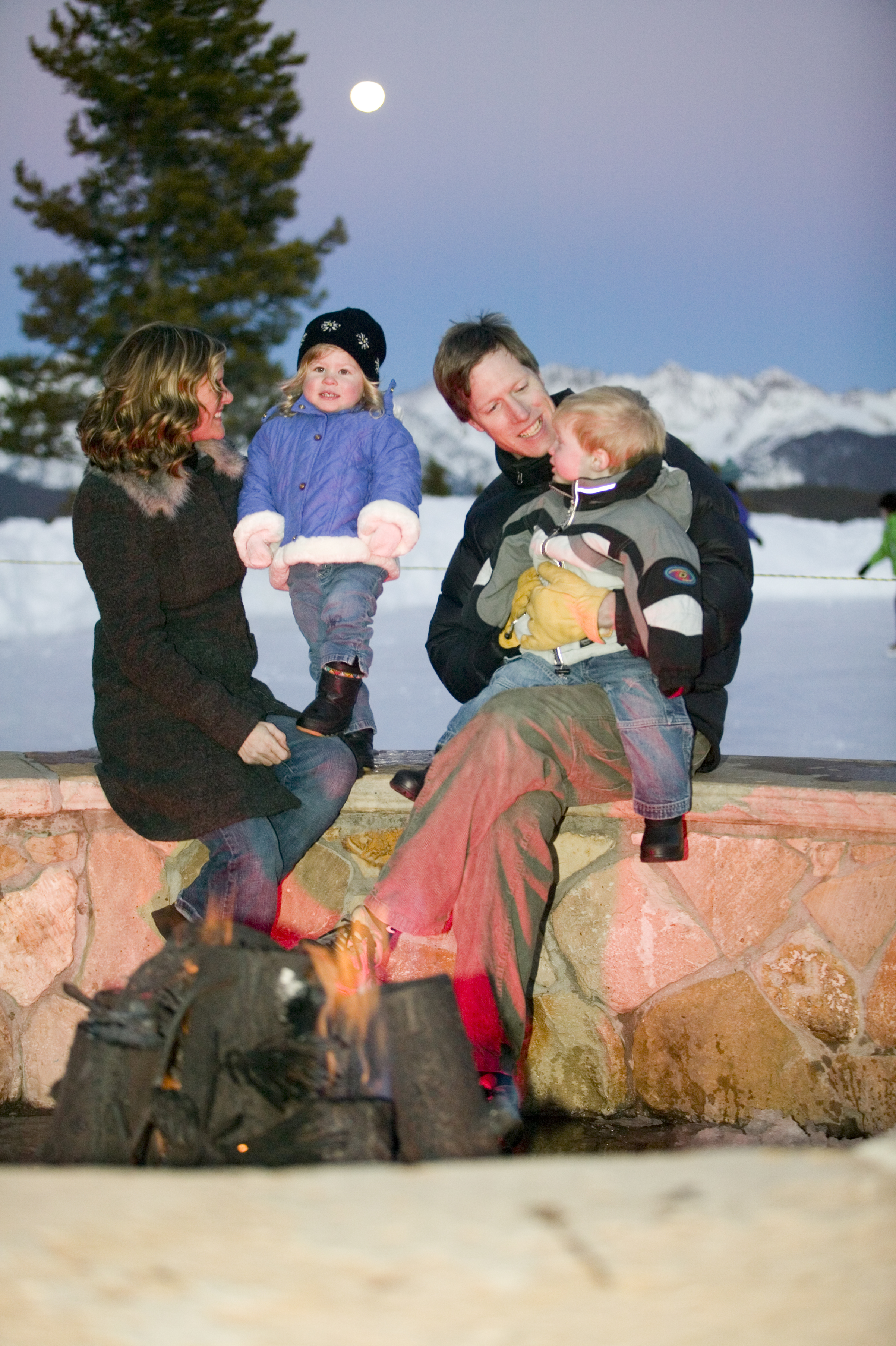 Winter family photo in front of mountain view
