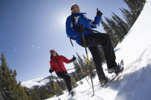 Couple snowshoeing in East Vail