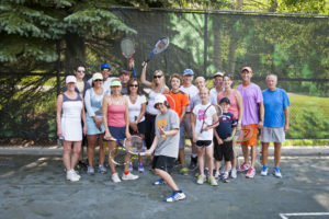 Family tennis group photo