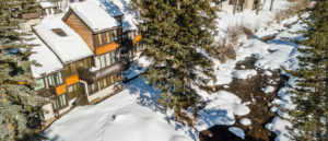 Aerial view of townhome in the winter