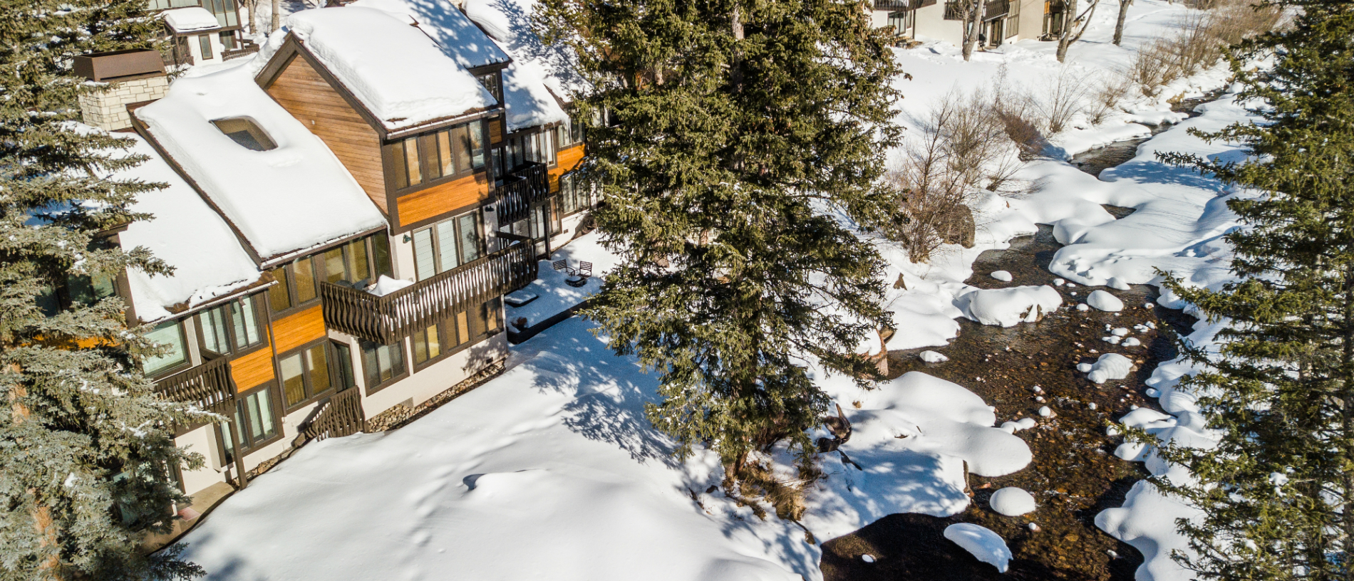 Aerial view of townhome in the winter