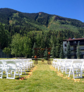 Chairs set up for an outdoor wedding ceremony