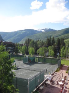 Elevated view over tennis courts and Vail Racquet Club