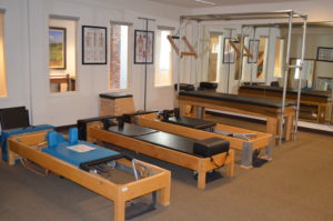 Pilates workout equipment in fitness center